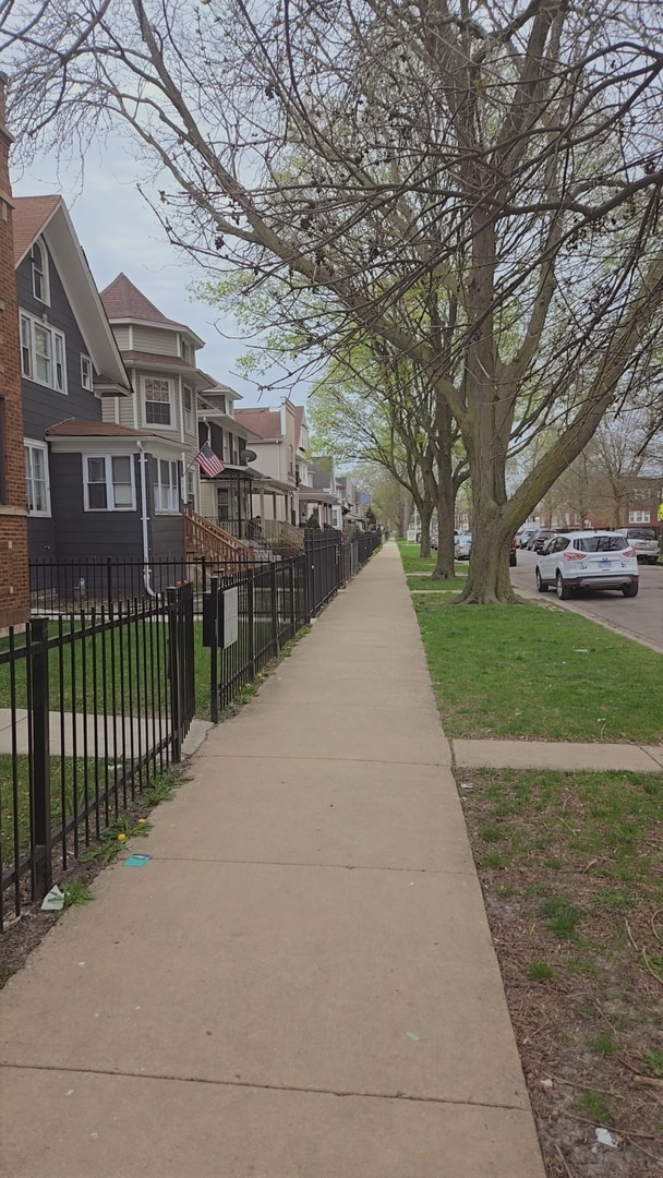 surrounding community featuring a lawn