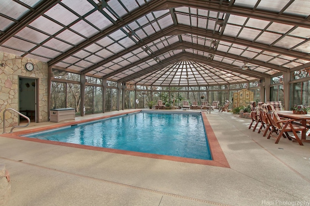 view of swimming pool with a patio area