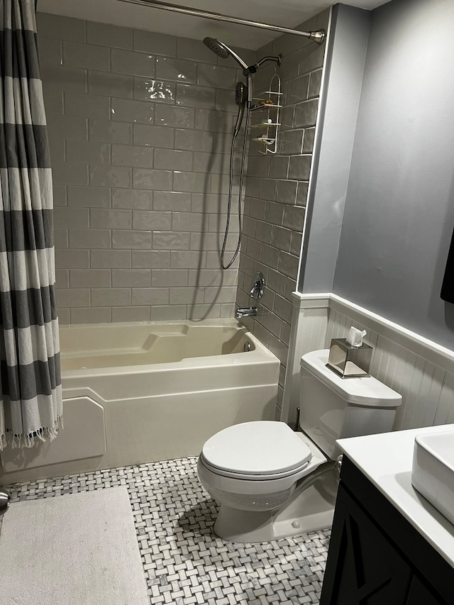 full bathroom featuring vanity, toilet, tile patterned floors, and shower / bathtub combination with curtain