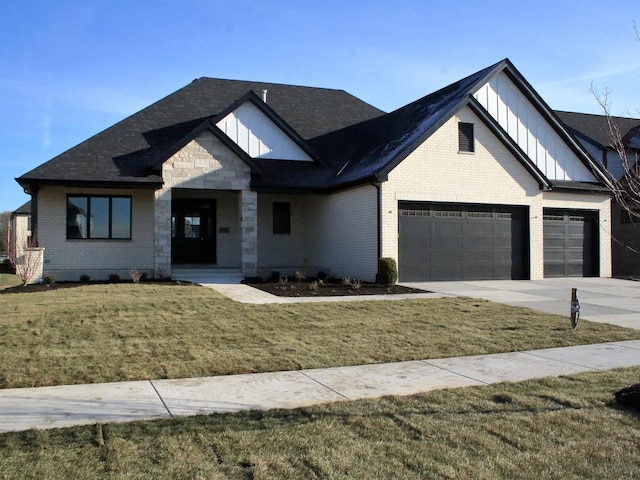 view of front of home featuring a garage and a front yard