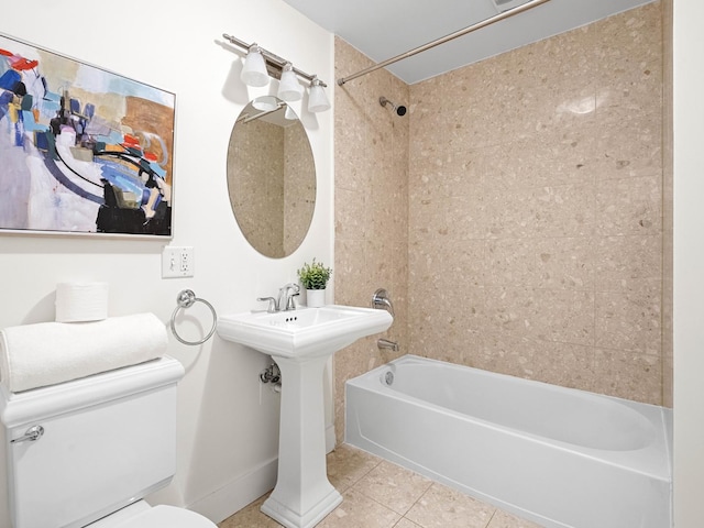 full bath featuring shower / washtub combination, tile patterned flooring, and toilet