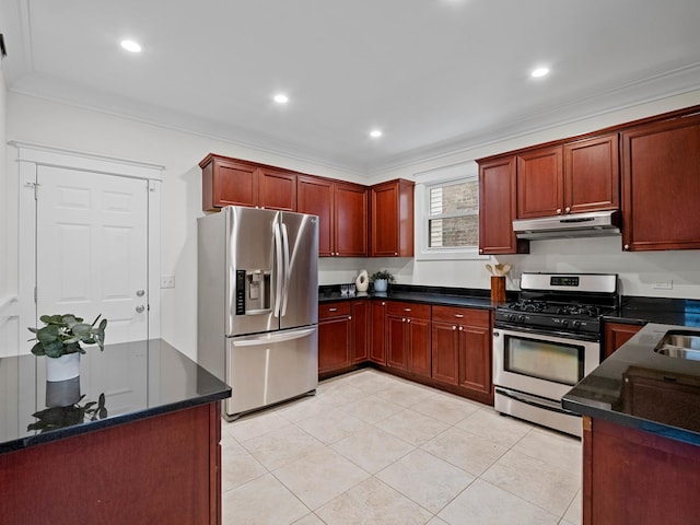 kitchen with light tile patterned floors, under cabinet range hood, stainless steel appliances, ornamental molding, and reddish brown cabinets