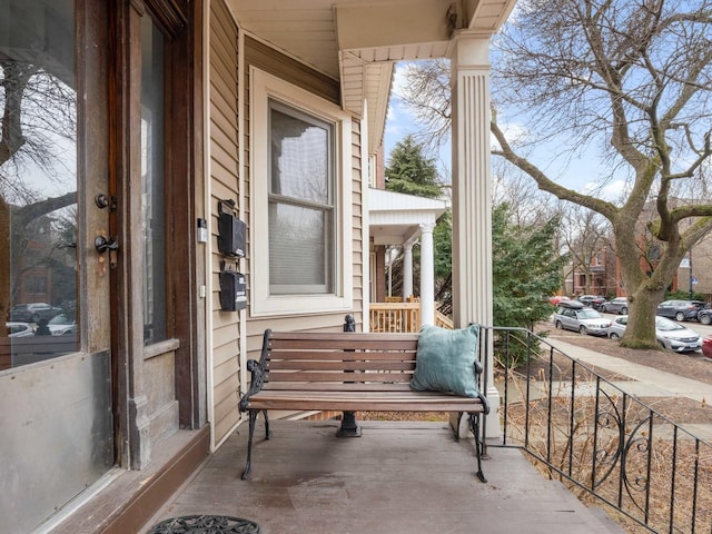 balcony featuring a porch