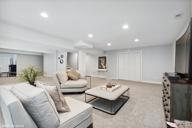 living room with light colored carpet