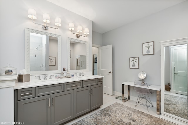 bathroom with tile floors and dual bowl vanity