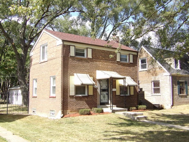 view of front facade with a front yard