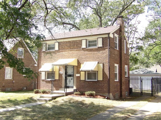 view of front facade featuring a front lawn