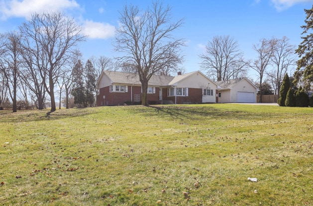 view of yard with a garage