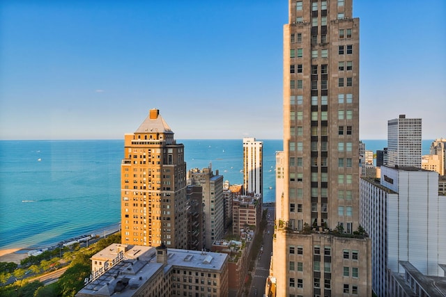 property's view of city featuring a water view