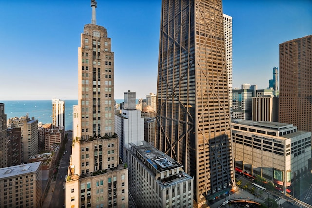 property's view of city featuring a water view