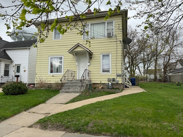 view of front facade with a front lawn