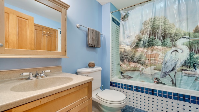 full bathroom featuring tile patterned flooring, vanity, toilet, and shower / bathtub combination with curtain