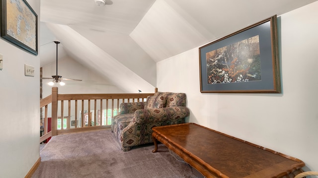 hall with carpet flooring and lofted ceiling