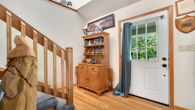 doorway with light hardwood / wood-style flooring