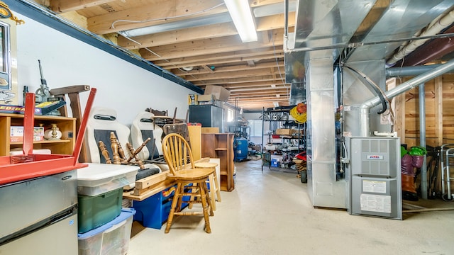 basement featuring heating unit