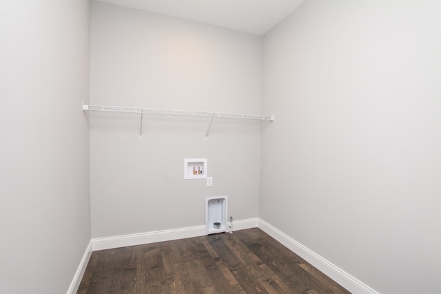 laundry area featuring dark hardwood / wood-style floors and hookup for a washing machine