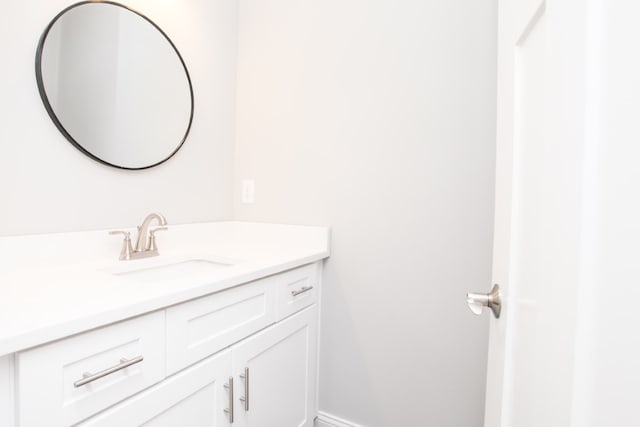 bathroom with vanity with extensive cabinet space