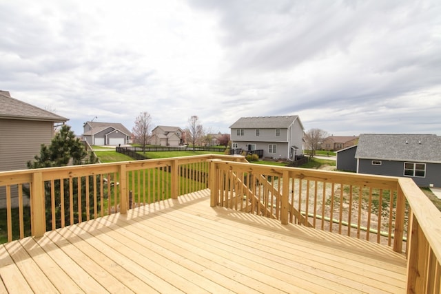 wooden deck with a yard