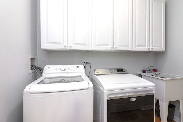 11 N Berkshire Ln, Round Lake, IL 60073 - washroom featuring washer and dryer and cabinet space