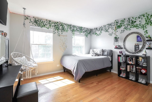 11 N Berkshire Ln, Round Lake, IL 60073 - bedroom featuring light wood finished floors and baseboards