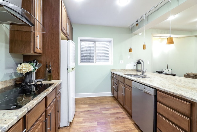 11 N Berkshire Ln, Round Lake, IL 60073 - kitchen with stainless steel dishwasher, black electric stovetop, freestanding refrigerator, light wood-type flooring, and extractor fan