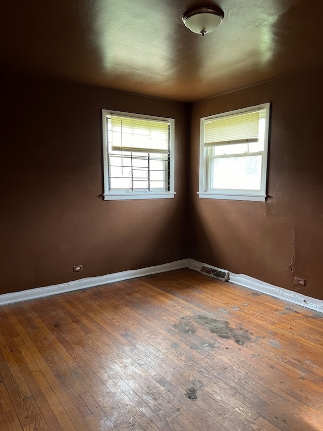 empty room featuring dark hardwood / wood-style floors