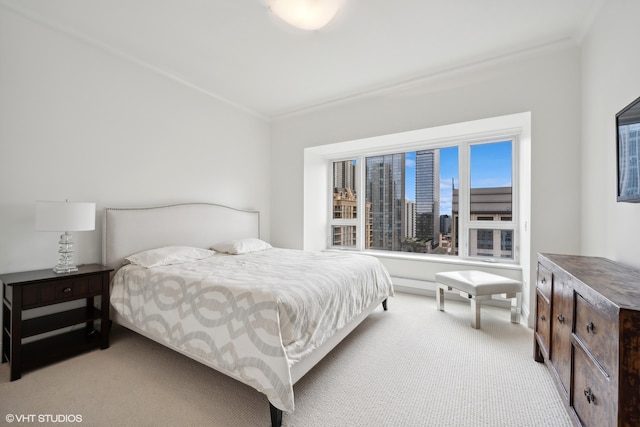 bedroom with light colored carpet and ornamental molding