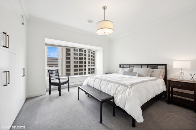 carpeted bedroom with ornamental molding