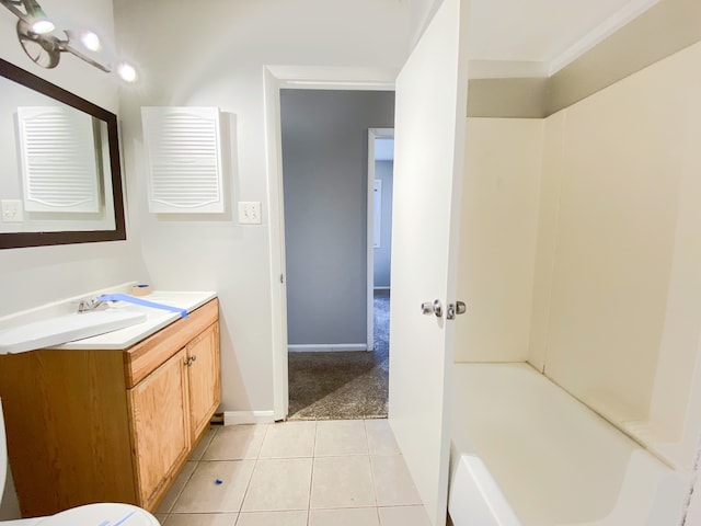 bathroom with vanity, washtub / shower combination, and tile patterned floors