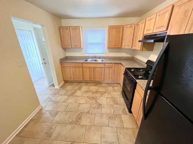 kitchen with light brown cabinets, sink, light tile floors, and black appliances