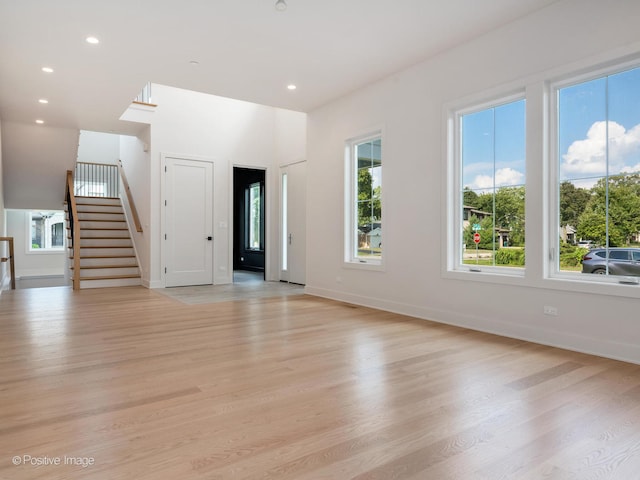 interior space featuring a healthy amount of sunlight and light hardwood / wood-style floors