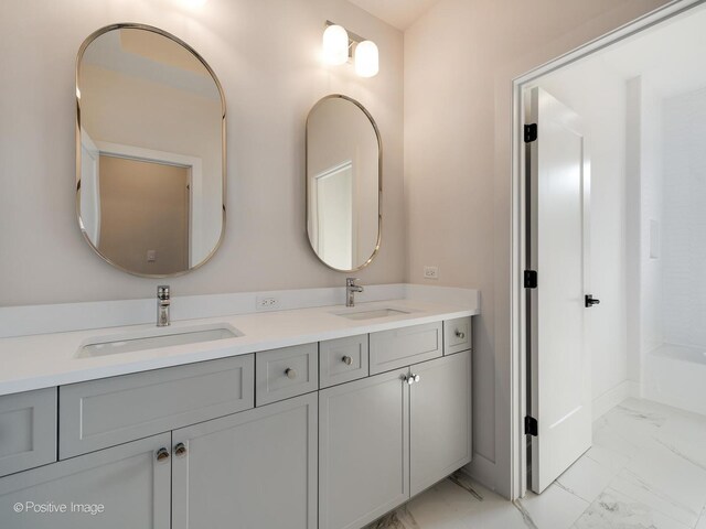 bathroom featuring tile patterned floors and vanity