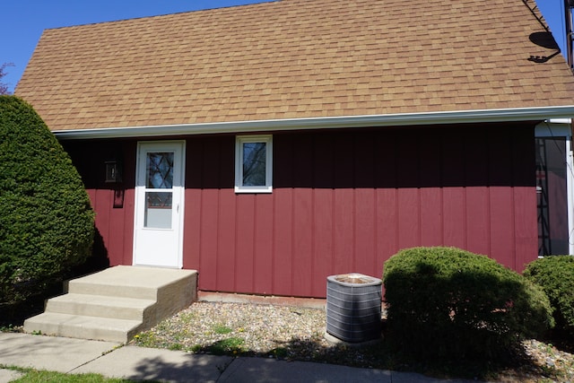 doorway to property with central air condition unit