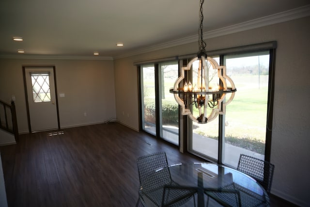 unfurnished dining area featuring plenty of natural light, dark wood-type flooring, and crown molding