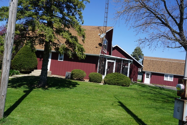 exterior space with a yard