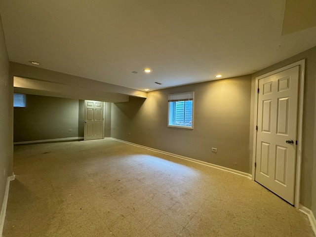 basement featuring tile flooring