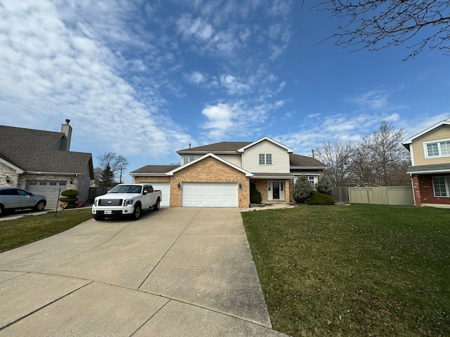 view of front of property with a garage and a front yard