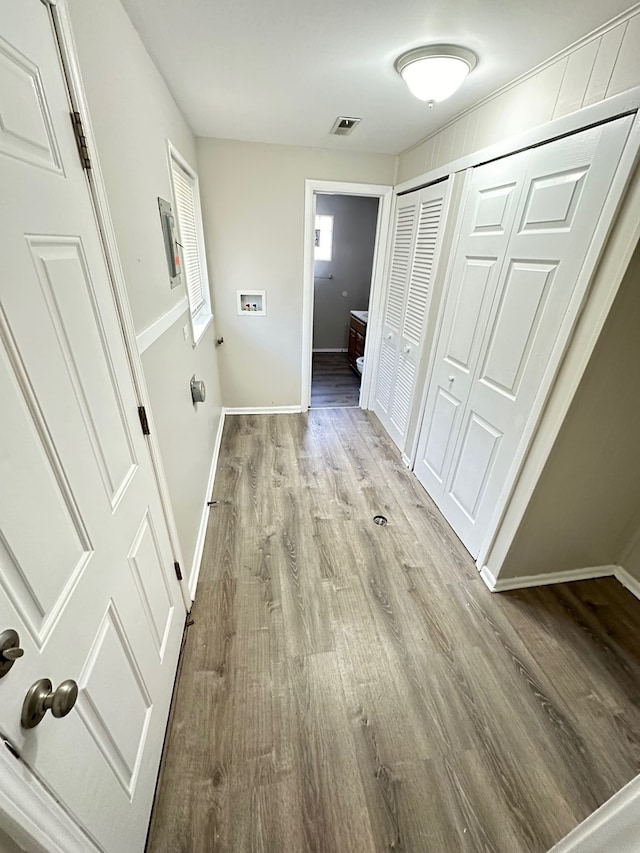 hallway featuring light wood-type flooring