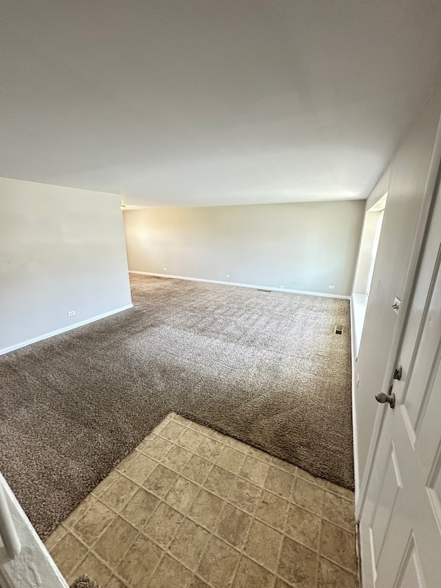 empty room with tile floors