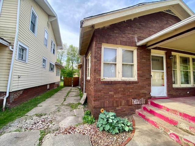 view of side of home featuring a patio area