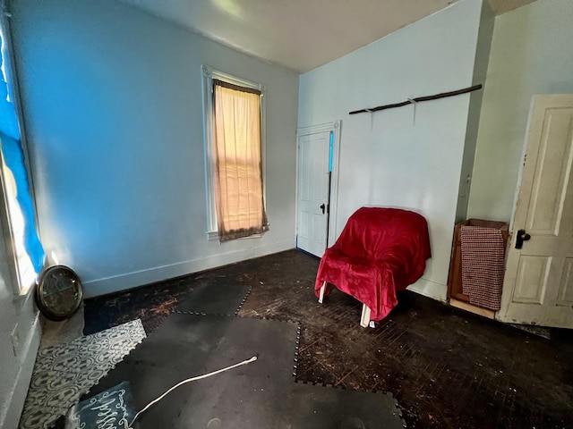657 W Wood St, Decatur, IL 62522 - bedroom featuring multiple windows and baseboards