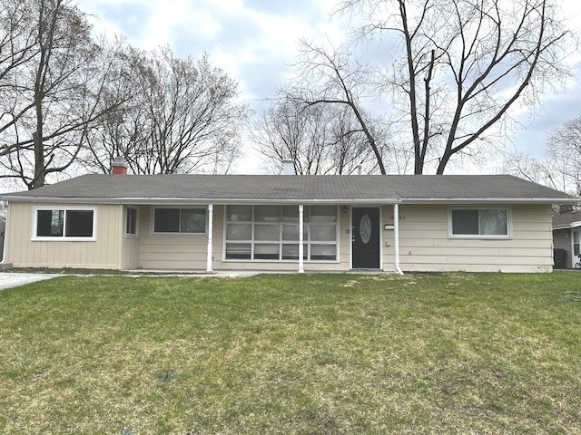 ranch-style home with a front yard