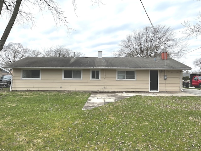 single story home with a front yard