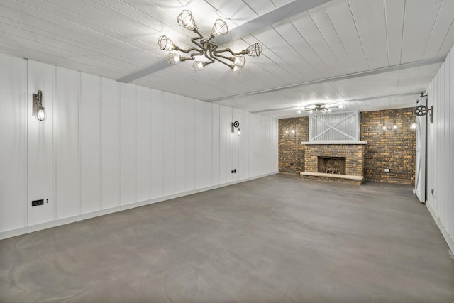 6840 157th St, Tinley Park, IL 60477 - unfurnished living room featuring a fireplace, finished concrete floors, and a chandelier