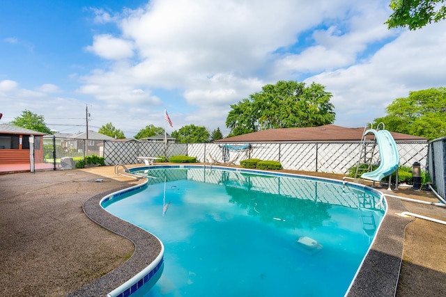 6840 157th St, Tinley Park, IL 60477 - view of swimming pool with a water slide, a diving board, and a patio