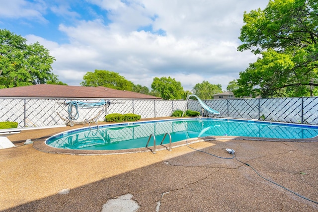 6840 157th St, Tinley Park, IL 60477 - view of pool featuring a water slide and a patio