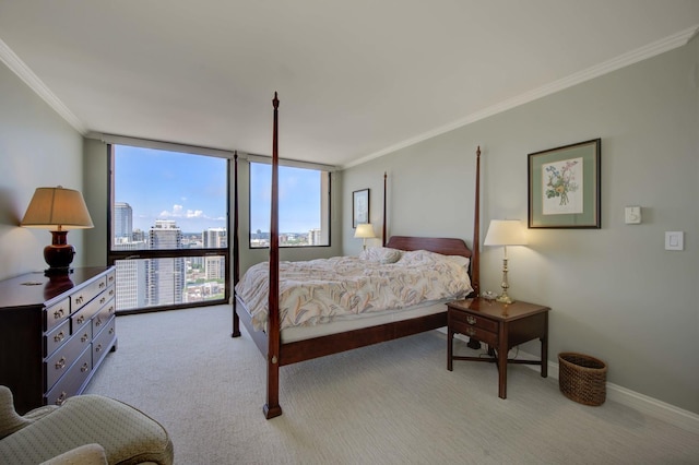 bedroom with light carpet, baseboards, a wall of windows, crown molding, and a city view