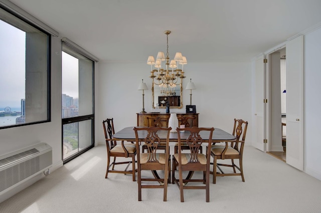 dining space featuring light colored carpet, baseboards, a wall mounted AC, a wall of windows, and an inviting chandelier