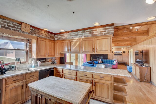 kitchen featuring light hardwood / wood-style flooring, wood walls, dishwasher, kitchen peninsula, and beamed ceiling