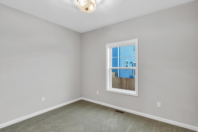 view of carpeted spare room